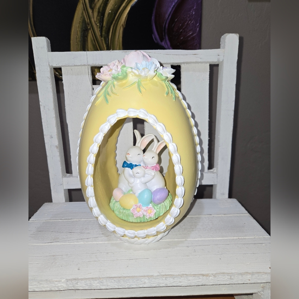 Bunny Family In A Yellow Easter Egg